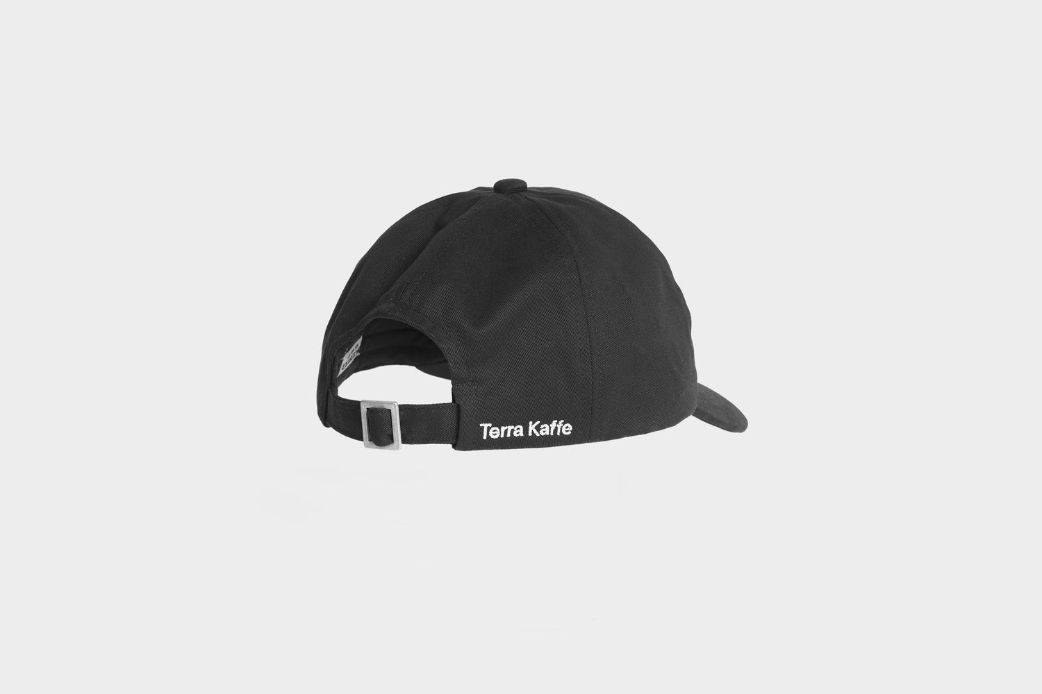 Terra Kaffe | Side view of black baseball cap with "Terra Kaffe" embroidery 