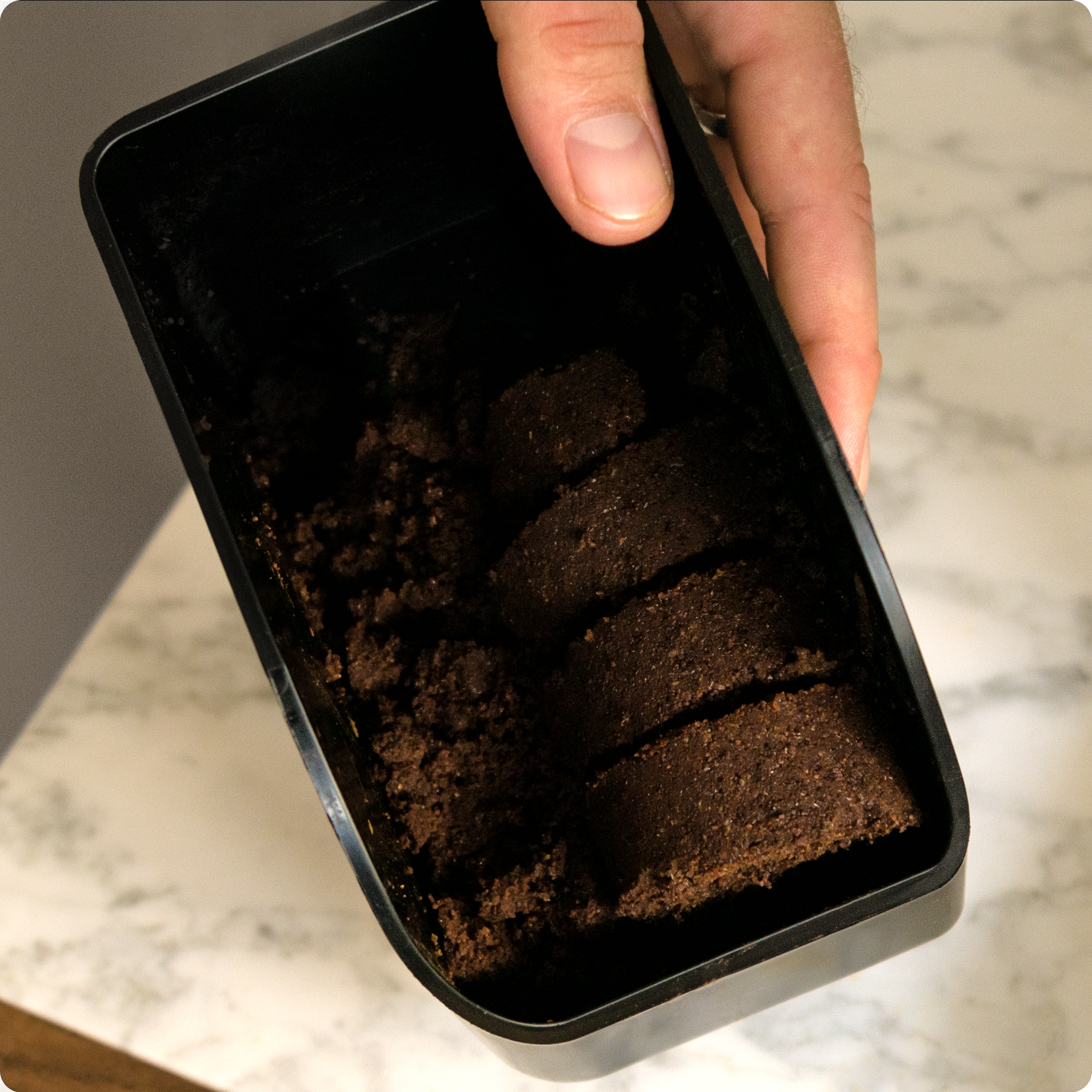 Terra Kaffe | TK-02 coffee waste pin with lined up pucks