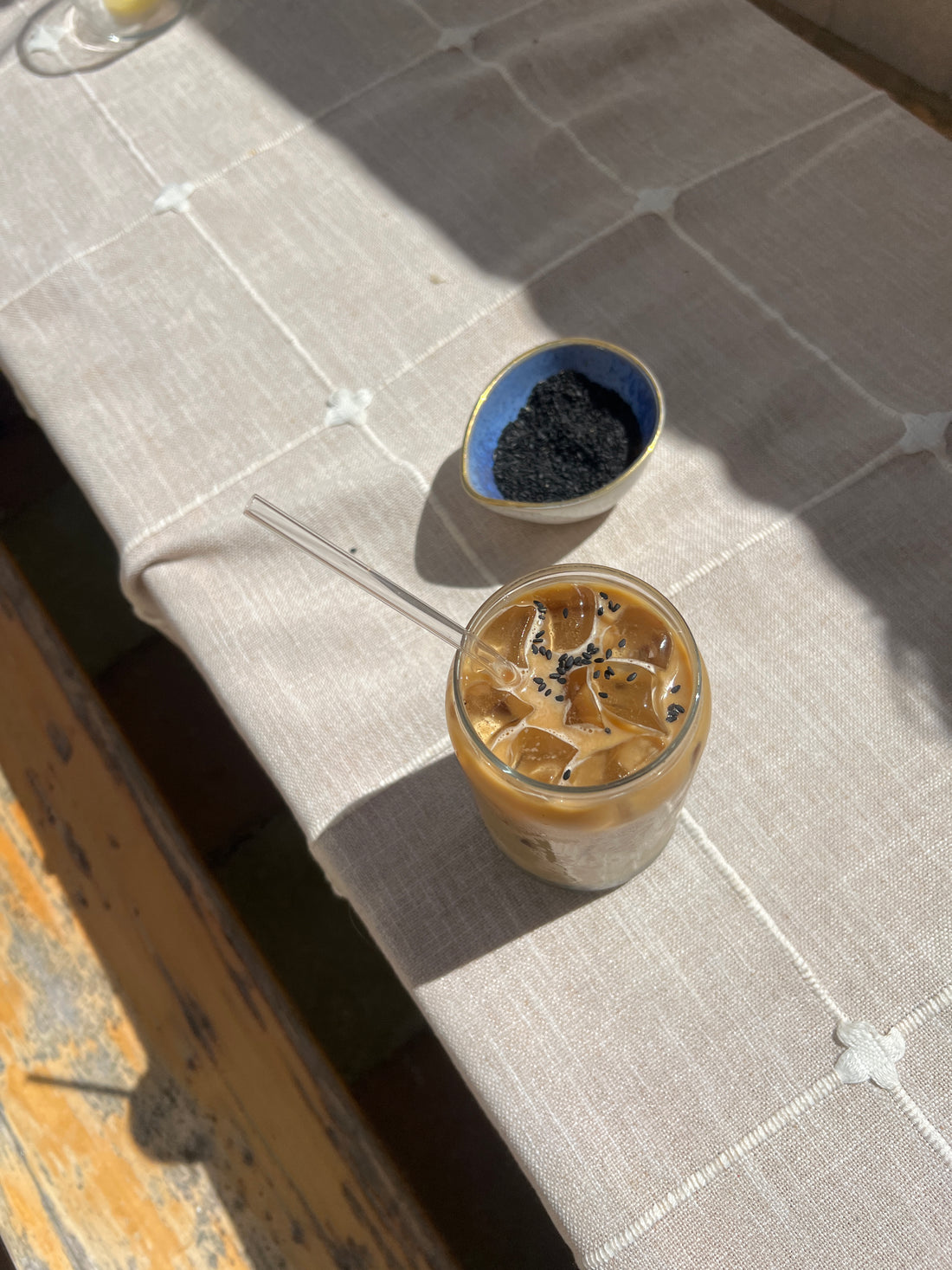 Black sesame latte in a glass with ice