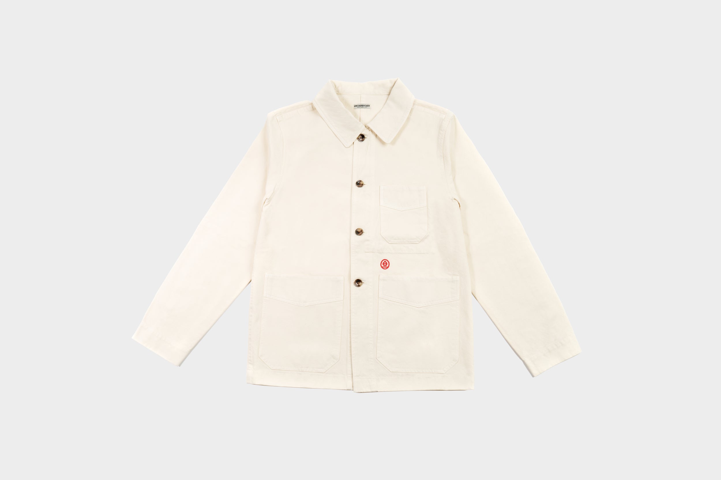 Terra Kaffe | Front view of cream-colored jacket with Terra Kaffe logo