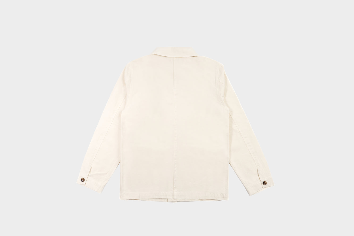 Terra Kaffe | The back of a cream-colored jacket