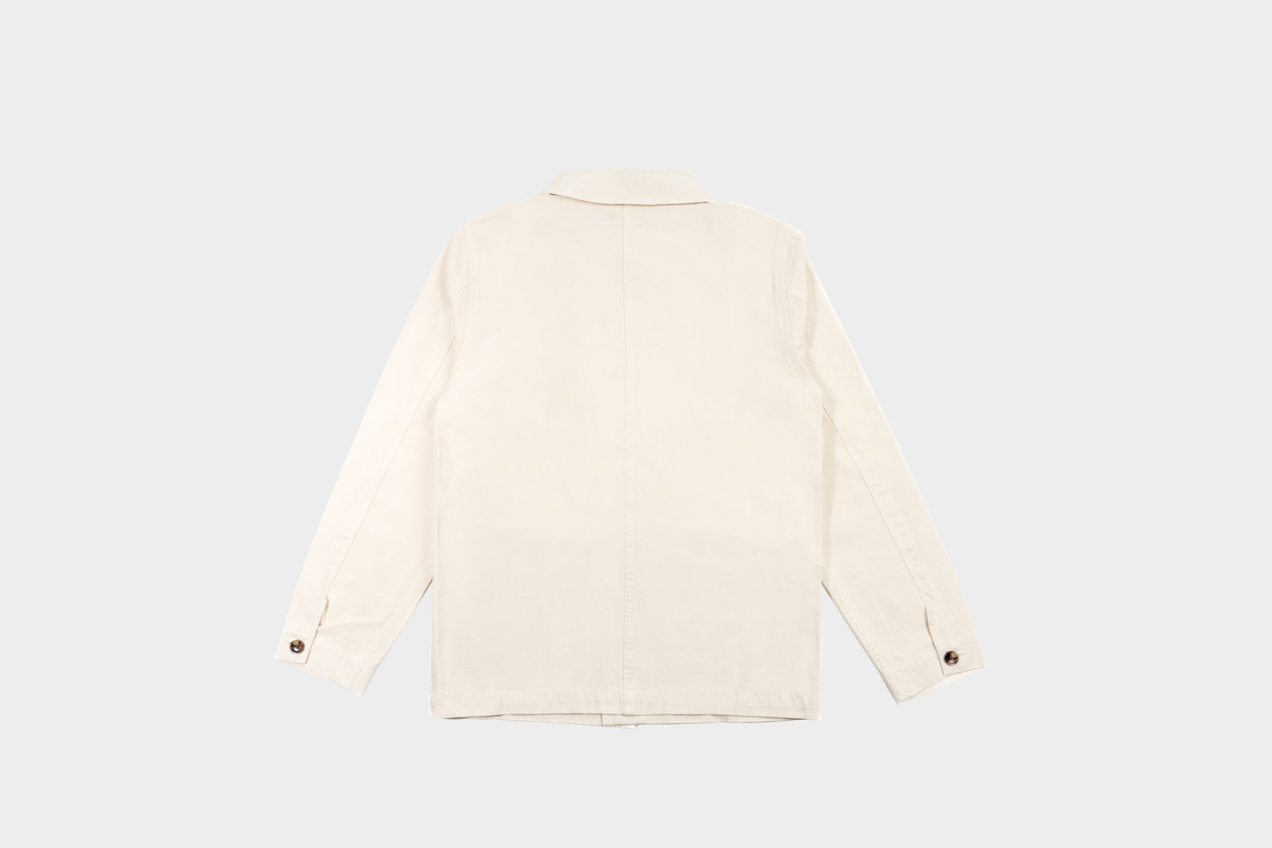 Terra Kaffe | The back of a cream-colored jacket
