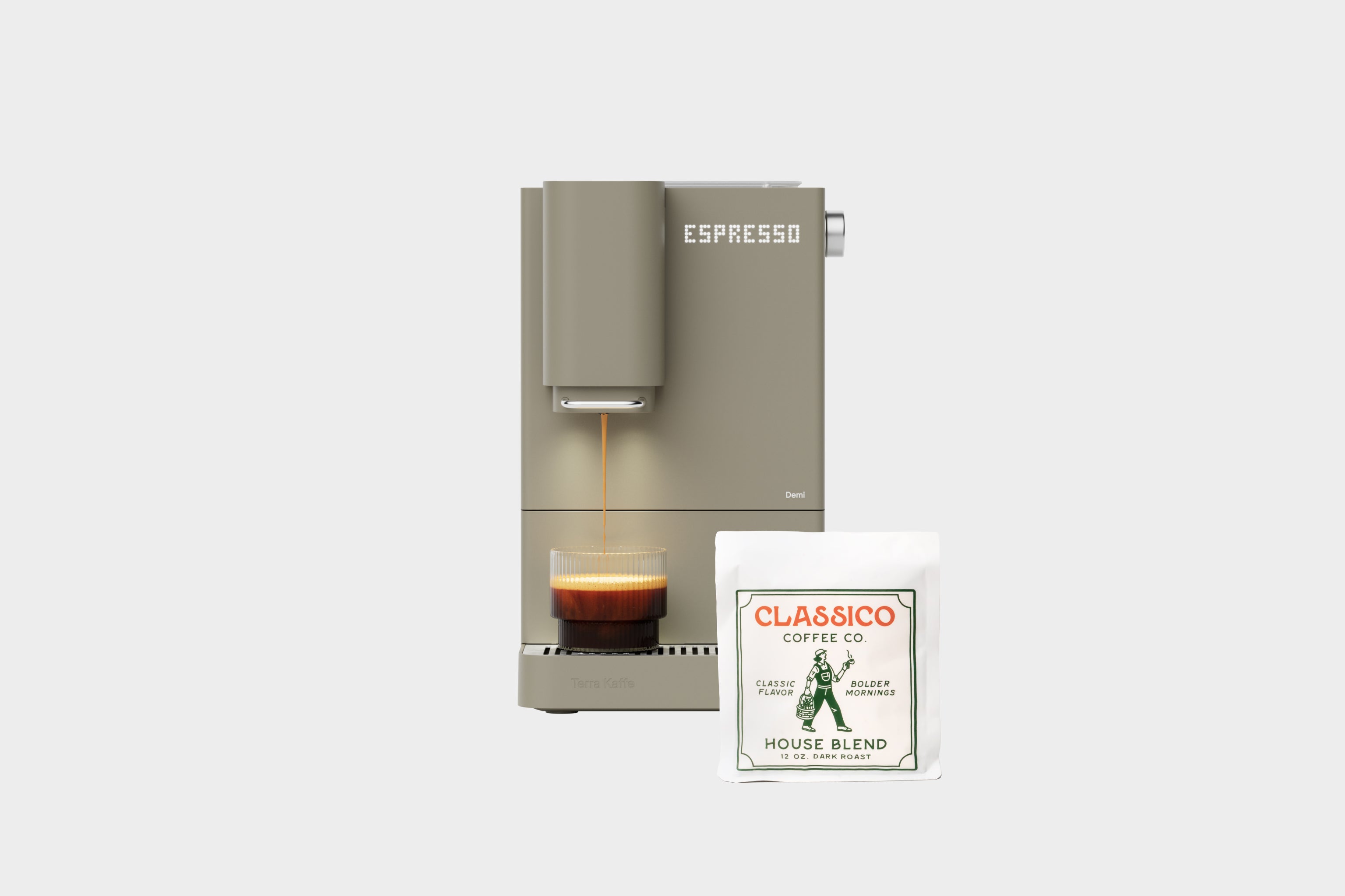 Dune colored Demi espresso machine dispensing coffee with a Classico Coffee Co. package on a white background
