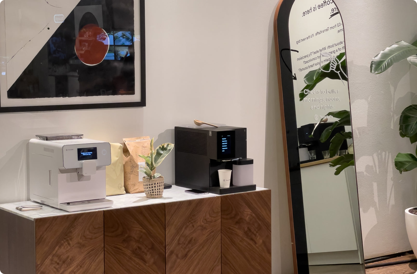 Terra Kaffe | White TK-01 and black TK-02 on a credenza at New York Coffee Festival
