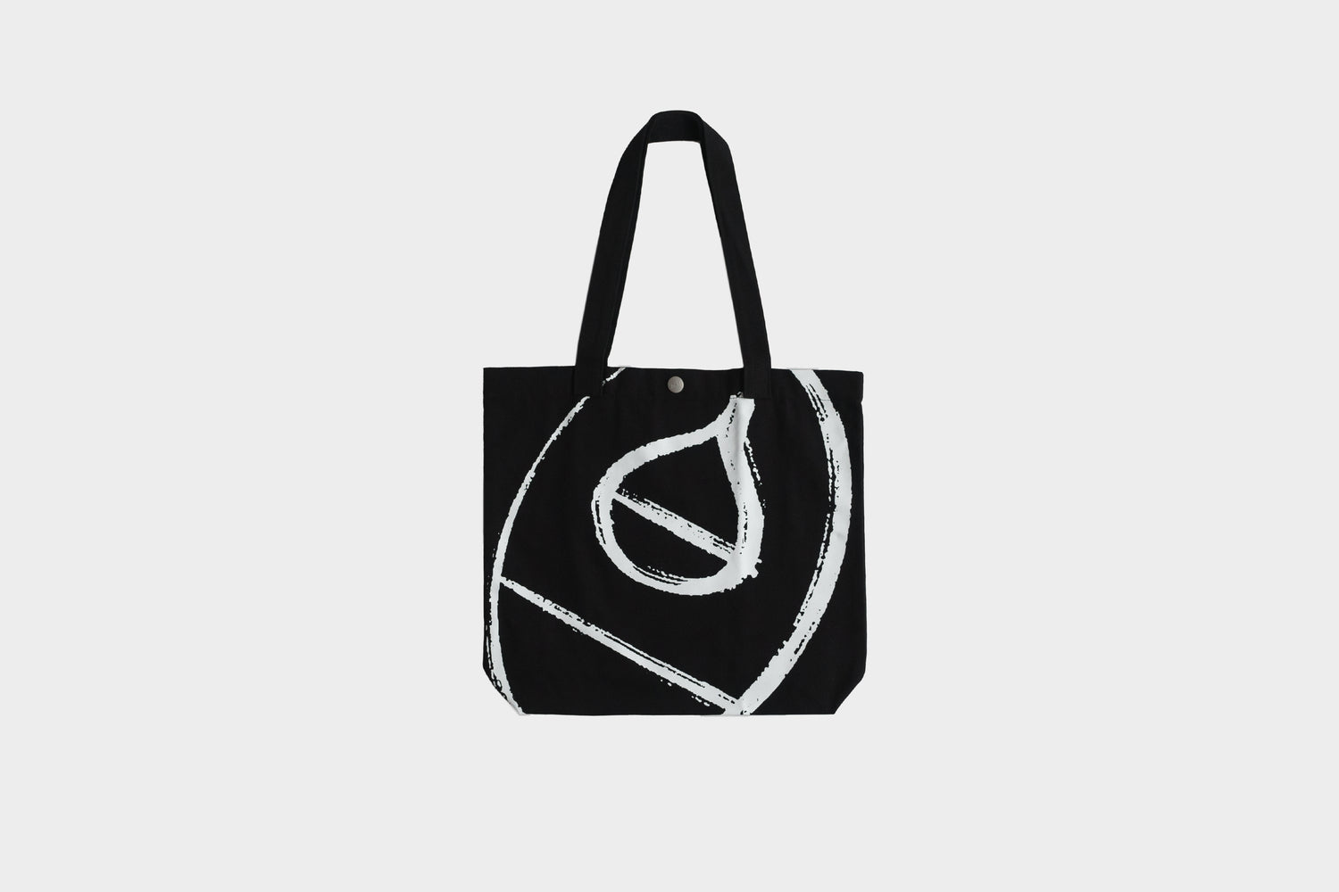 Terra Kaffe | Black tote bag with large white Terra Kaffe logo painted on